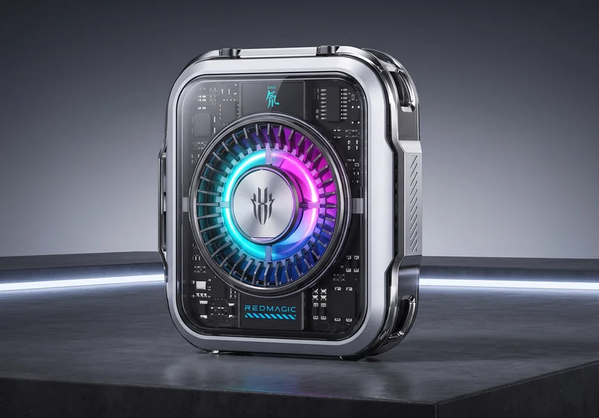 Premium studio display of the silver Red Magic Cooler 5 Pro featuring a transparent casing that reveals the internal circuit board and bright neon pink and blue RGB lighting